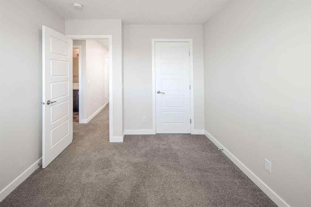 MLS® A2262423 - 70 Evanscrest Road NW in Evanston Calgary, Residential