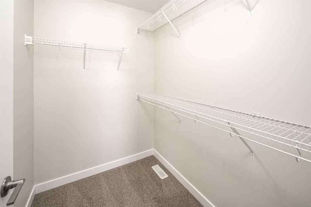 MLS® A2262423 - 70 Evanscrest Road NW in Evanston Calgary, Residential