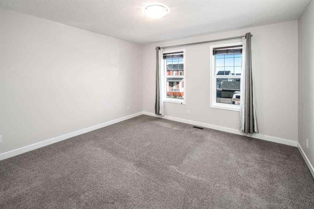 MLS® A2262423 - 70 Evanscrest Road NW in Evanston Calgary, Residential