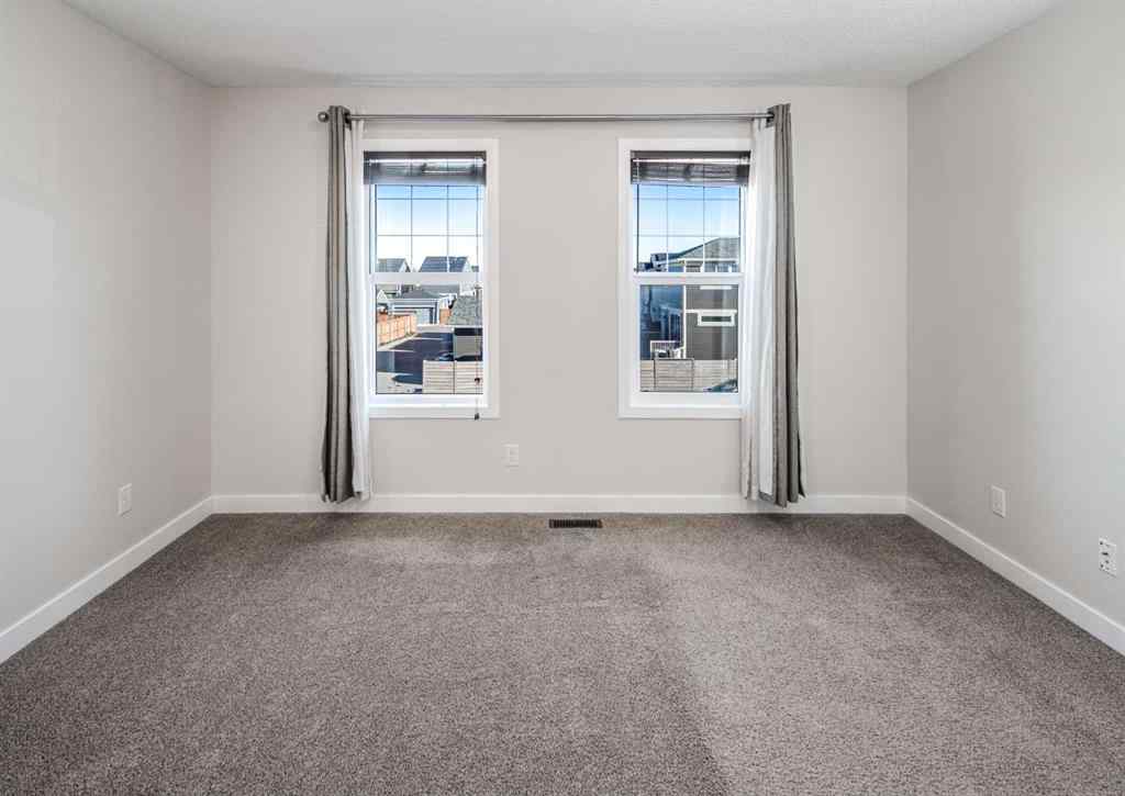 MLS® A2262423 - 70 Evanscrest Road NW in Evanston Calgary, Residential