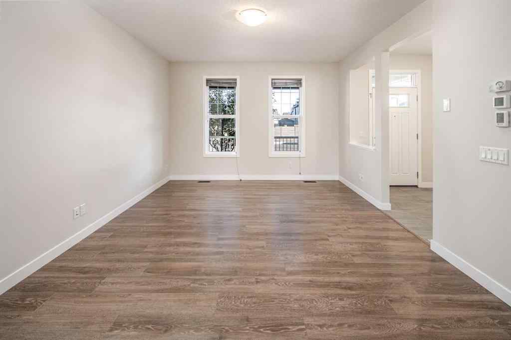 MLS® A2262423 - 70 Evanscrest Road NW in Evanston Calgary, Residential