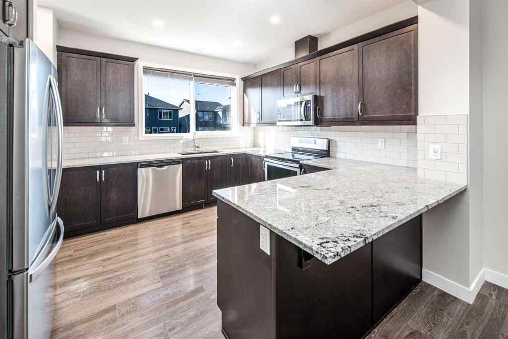 MLS® A2262423 - 70 Evanscrest Road NW in Evanston Calgary, Residential