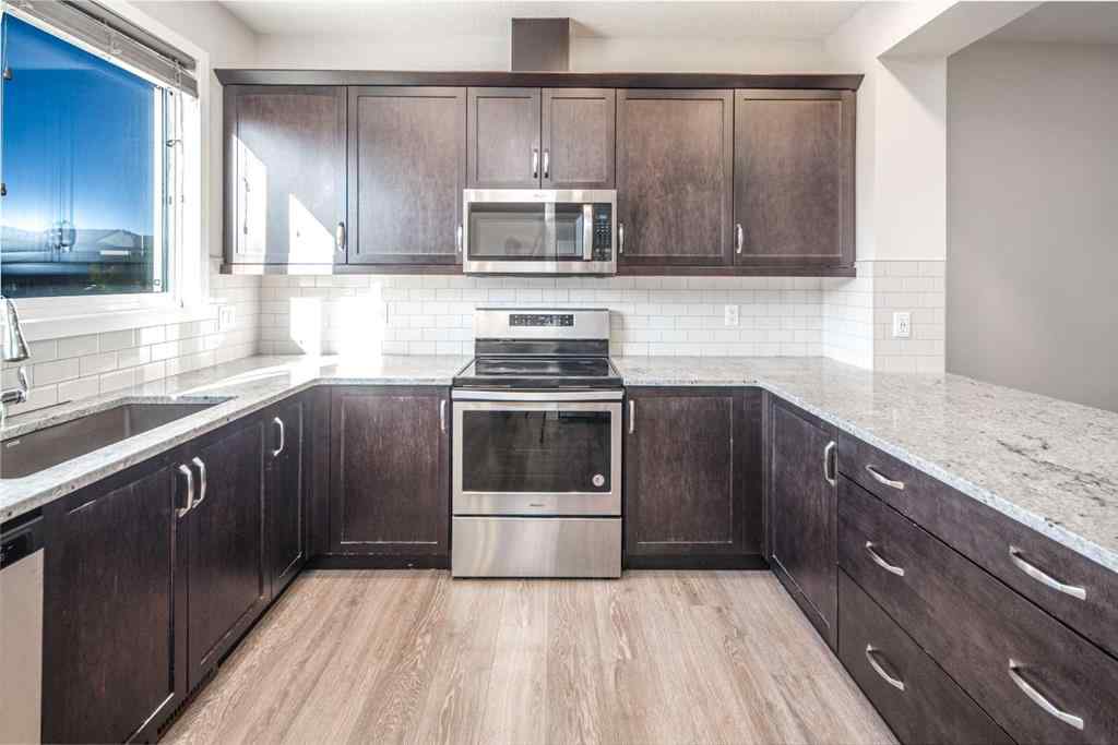 MLS® A2262423 - 70 Evanscrest Road NW in Evanston Calgary, Residential