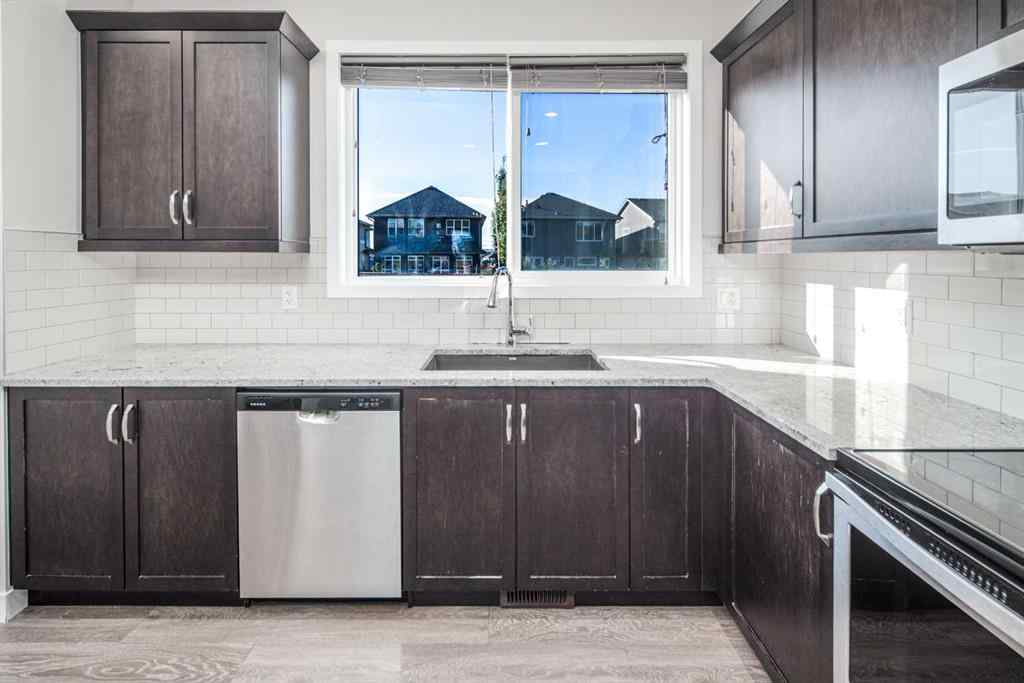 MLS® A2262423 - 70 Evanscrest Road NW in Evanston Calgary, Residential