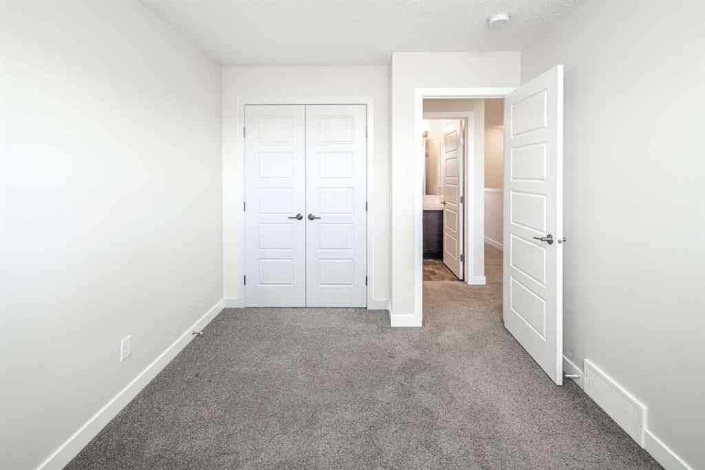 MLS® A2262423 - 70 Evanscrest Road NW in Evanston Calgary, Residential