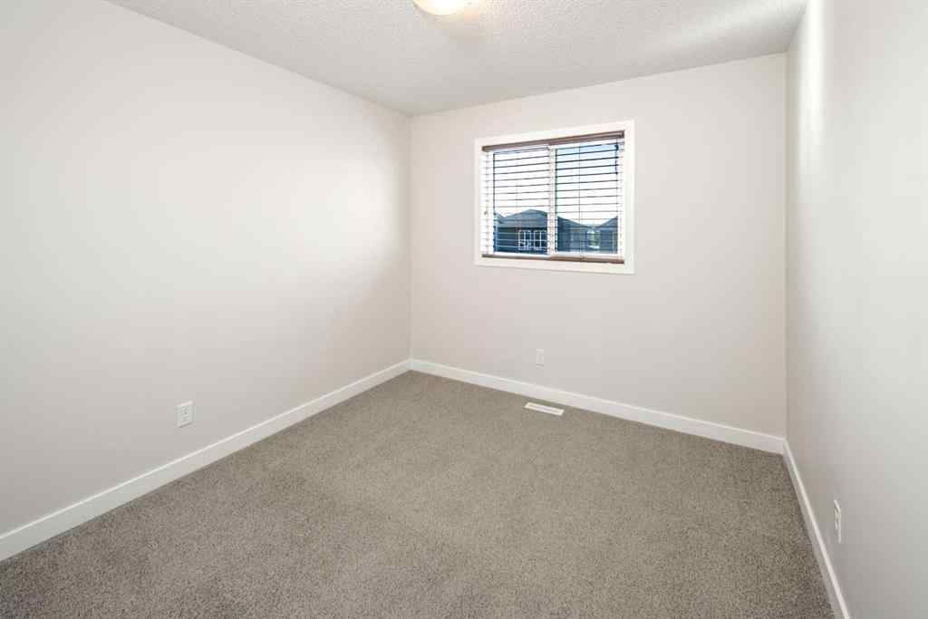 MLS® A2262423 - 70 Evanscrest Road NW in Evanston Calgary, Residential