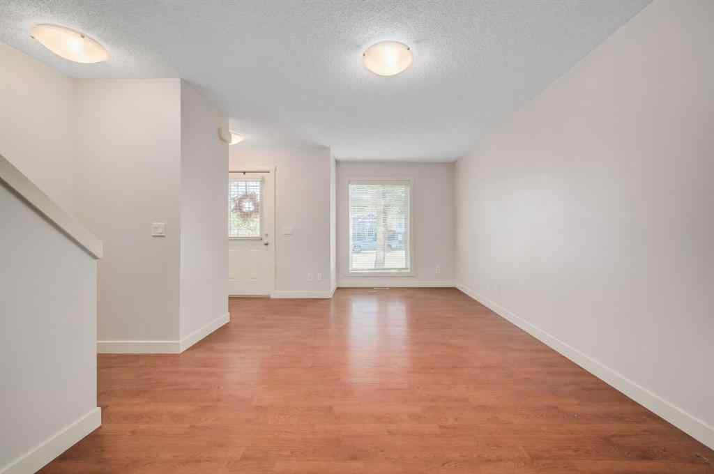 MLS® A2262432 - Unit #1203 2445 Kingsland Road SE in Kings Heights Airdrie, Residential