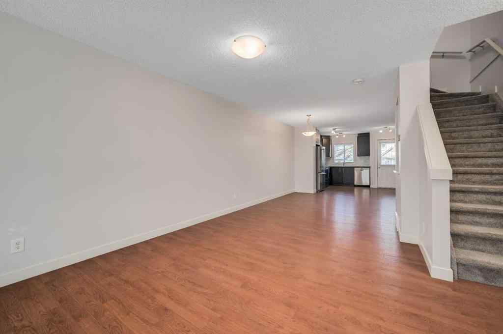 MLS® A2262432 - Unit #1203 2445 Kingsland Road SE in Kings Heights Airdrie, Residential