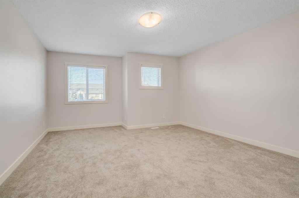 MLS® A2262432 - Unit #1203 2445 Kingsland Road SE in Kings Heights Airdrie, Residential