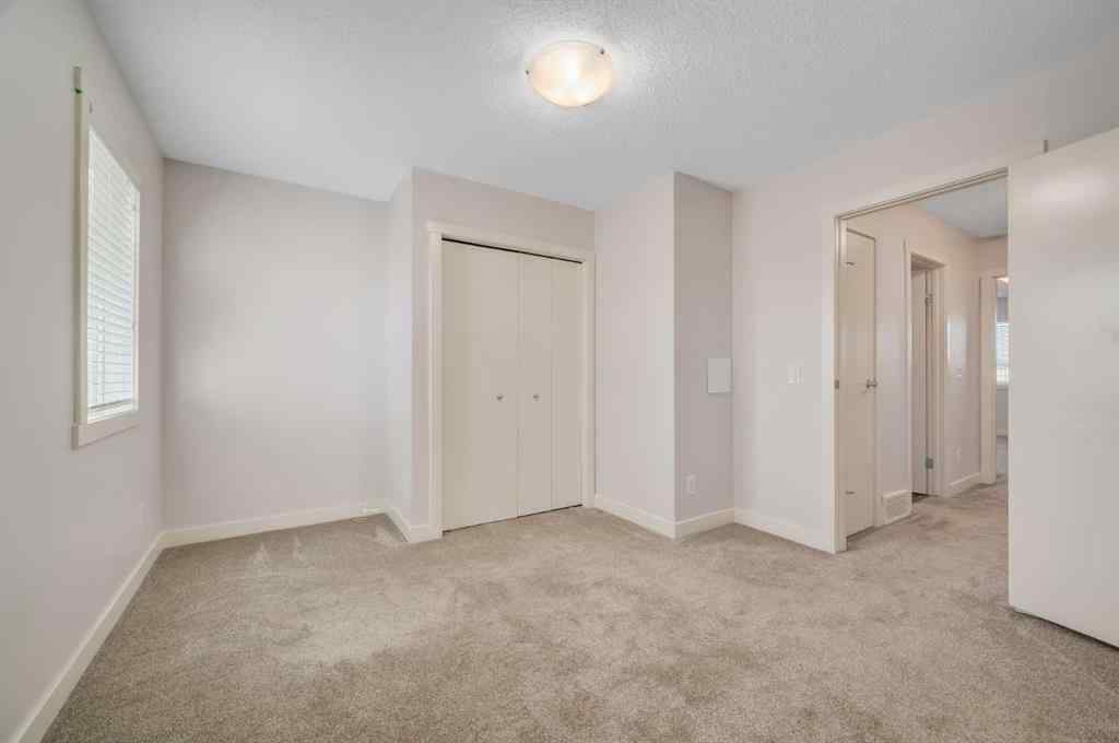 MLS® A2262432 - Unit #1203 2445 Kingsland Road SE in Kings Heights Airdrie, Residential