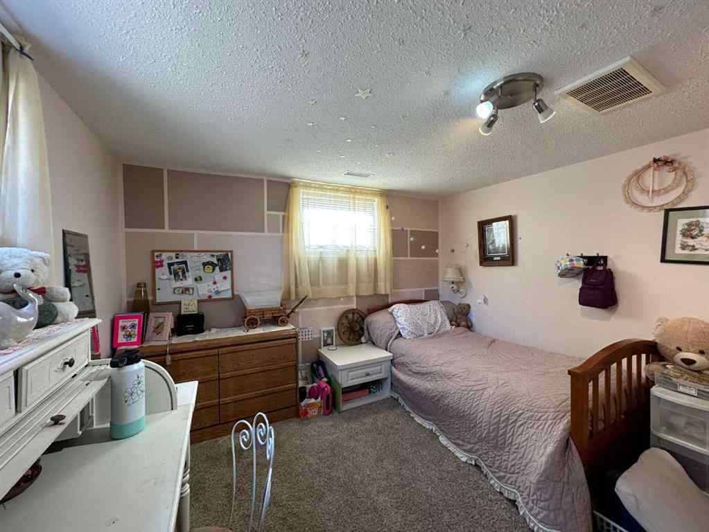 MLS® A2262450 - 5213 49 Avenue  in Central Ponoka Ponoka, Residential