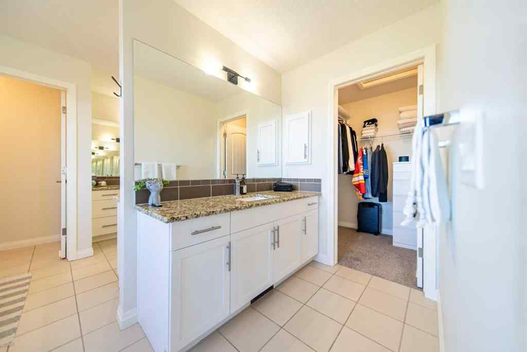 MLS® A2262469 - 27 Sunset Park  in Sunset Ridge Cochrane, Residential