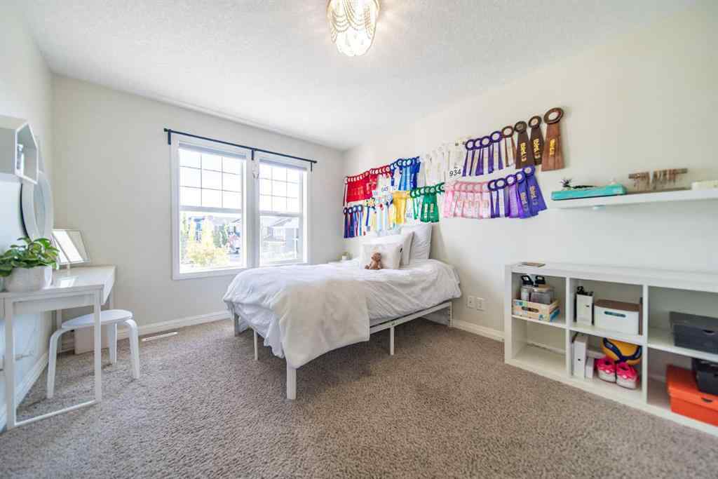 MLS® A2262469 - 27 Sunset Park  in Sunset Ridge Cochrane, Residential