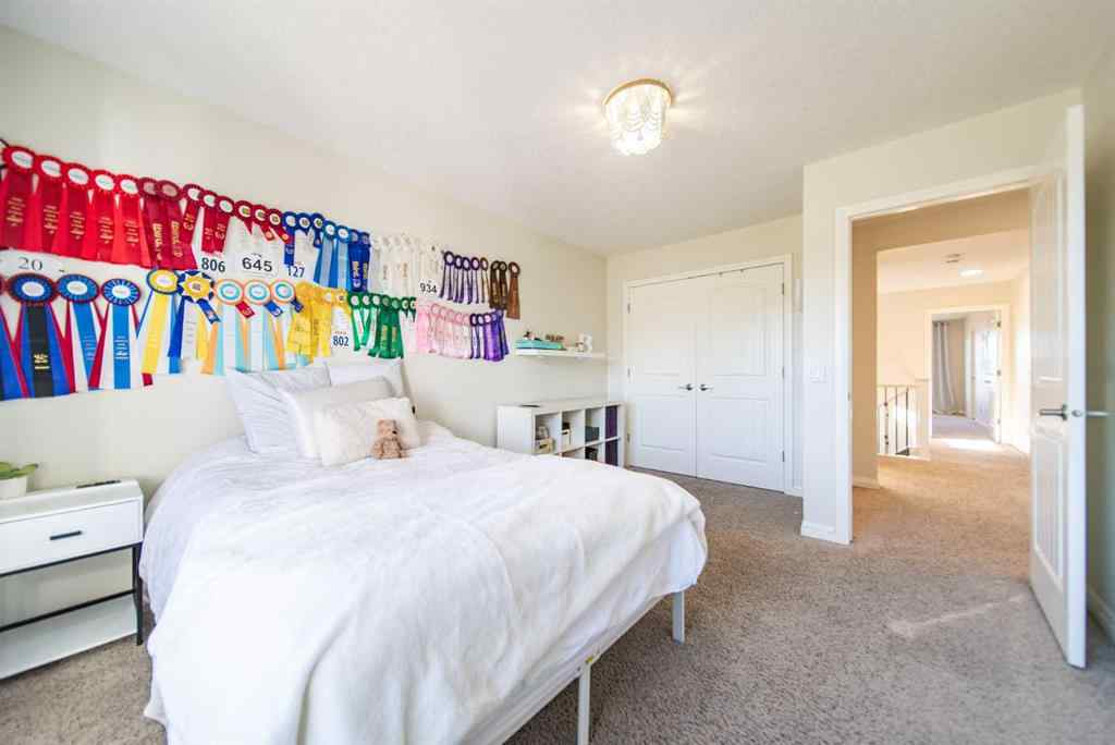 MLS® A2262469 - 27 Sunset Park  in Sunset Ridge Cochrane, Residential