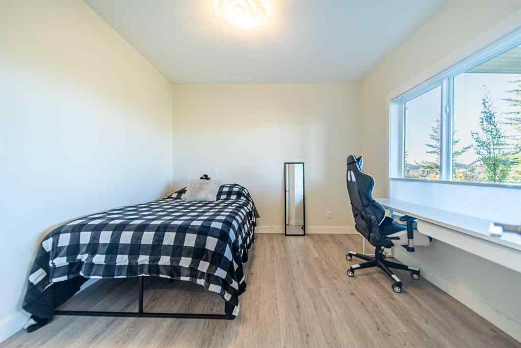 MLS® A2262469 - 27 Sunset Park  in Sunset Ridge Cochrane, Residential