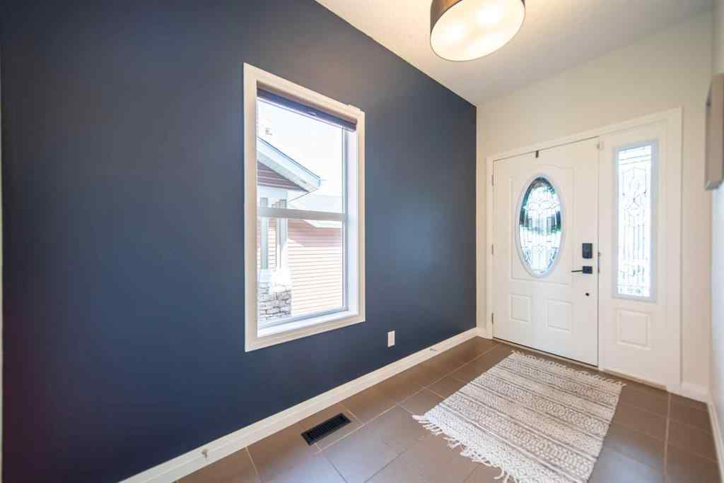 MLS® A2262469 - 27 Sunset Park  in Sunset Ridge Cochrane, Residential