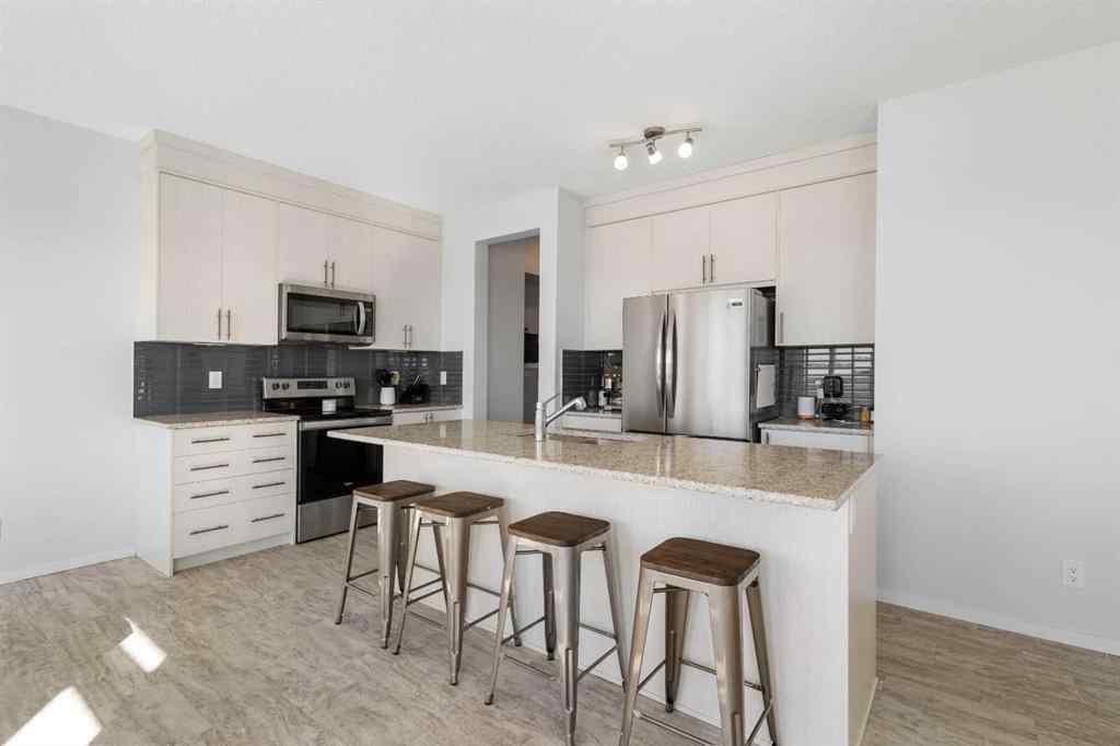 MLS® A2262475 - 124 Carringham Way NW in Carrington Calgary, Residential