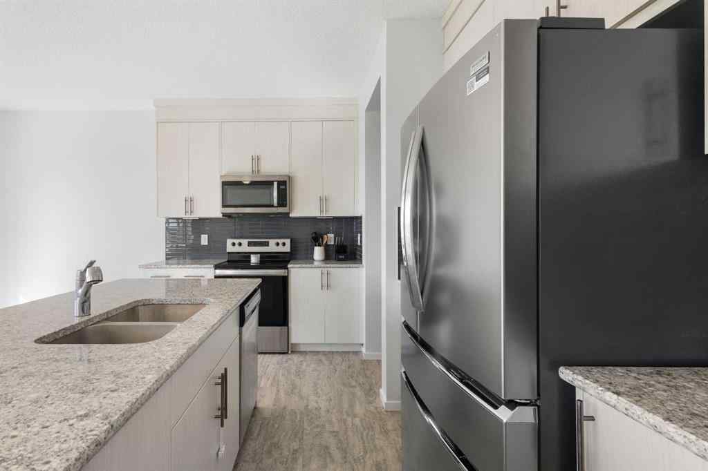 MLS® A2262475 - 124 Carringham Way NW in Carrington Calgary, Residential