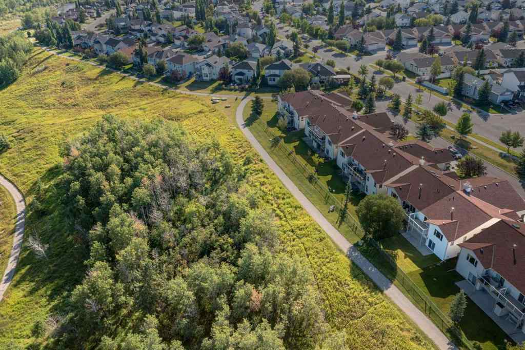 MLS® A2262482 - Unit #34 100 Sheep River Drive  in Sheep River Ridge Okotoks, Residential