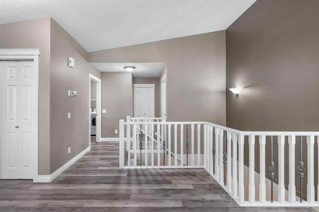 MLS® A2262482 - Unit #34 100 Sheep River Drive  in Sheep River Ridge Okotoks, Residential