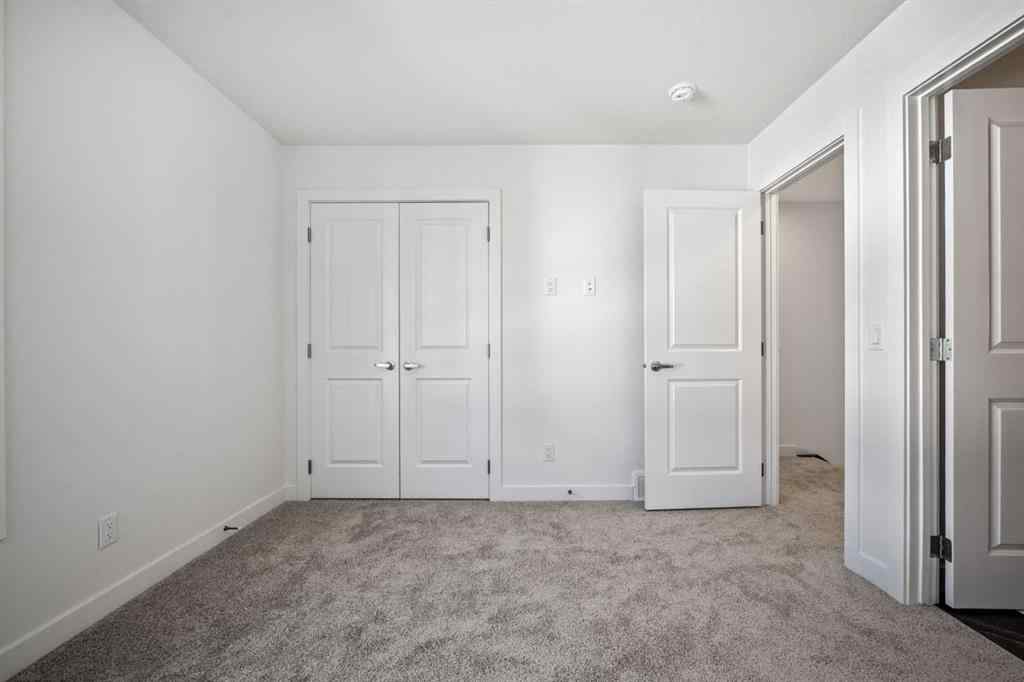 MLS® A2262499 - Unit #116 8235 8 Avenue SW in West Springs Calgary, Residential