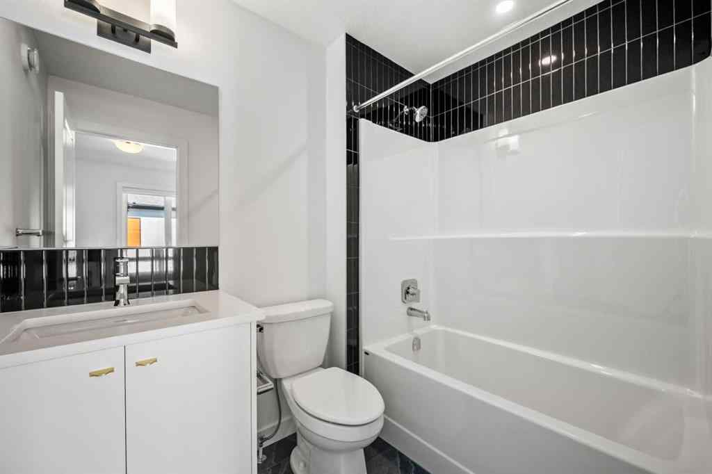 MLS® A2262499 - Unit #116 8235 8 Avenue SW in West Springs Calgary, Residential