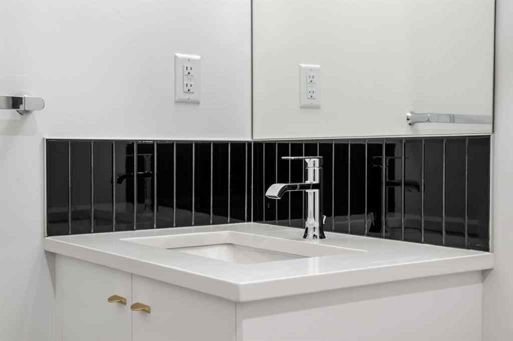 MLS® A2262499 - Unit #116 8235 8 Avenue SW in West Springs Calgary, Residential