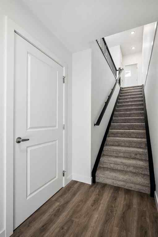 MLS® A2262499 - Unit #116 8235 8 Avenue SW in West Springs Calgary, Residential