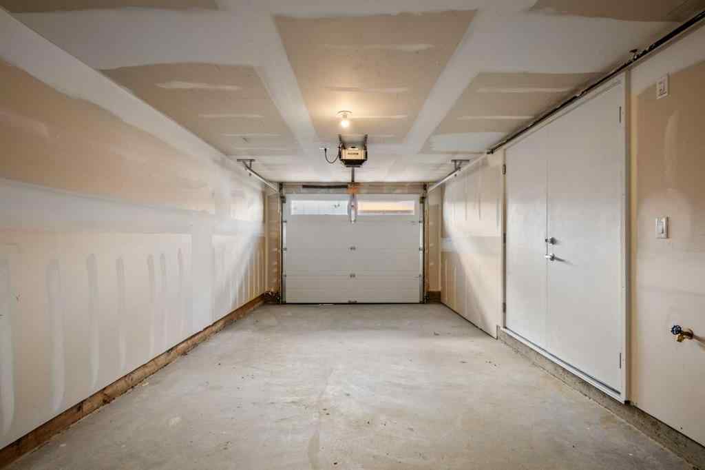 MLS® A2262499 - Unit #116 8235 8 Avenue SW in West Springs Calgary, Residential