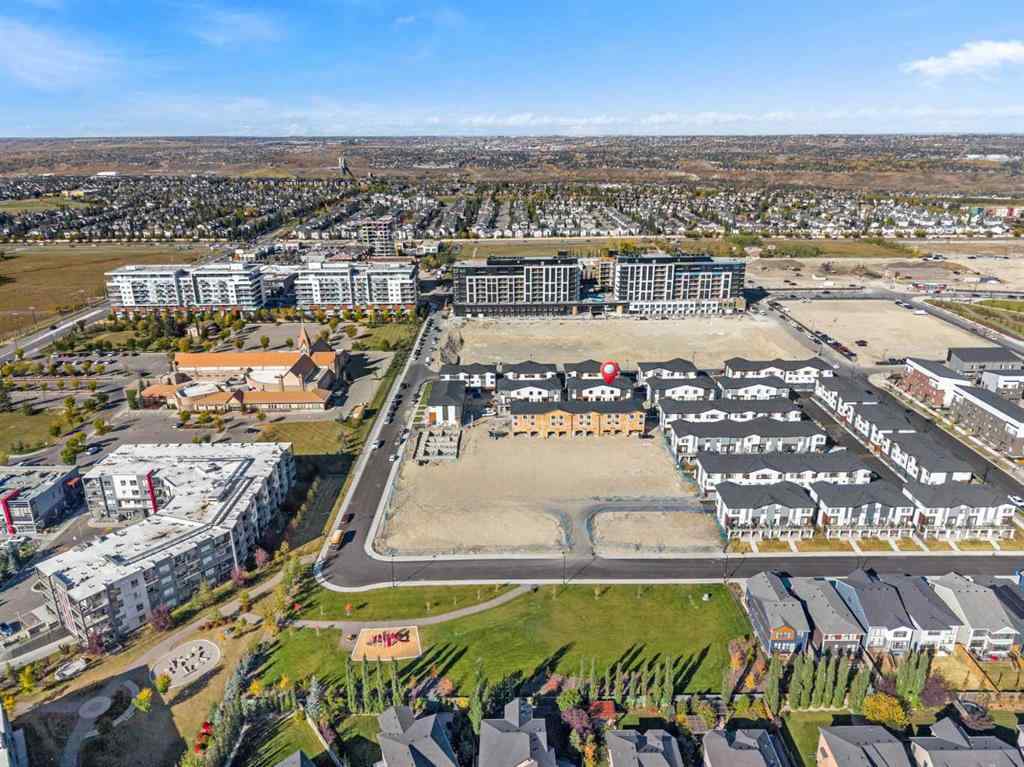 MLS® A2262499 - Unit #116 8235 8 Avenue SW in West Springs Calgary, Residential