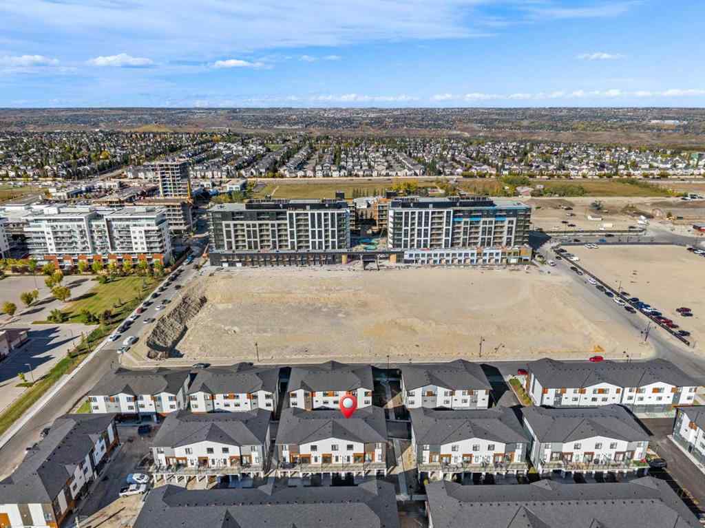 MLS® A2262499 - Unit #116 8235 8 Avenue SW in West Springs Calgary, Residential