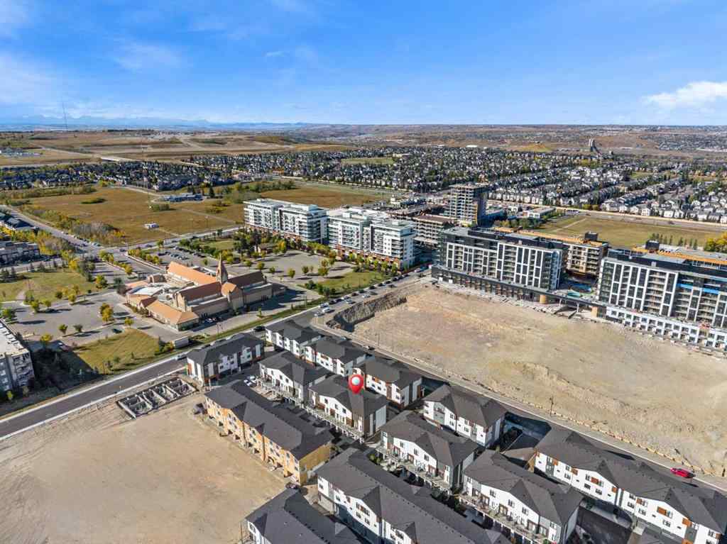 MLS® A2262499 - Unit #116 8235 8 Avenue SW in West Springs Calgary, Residential