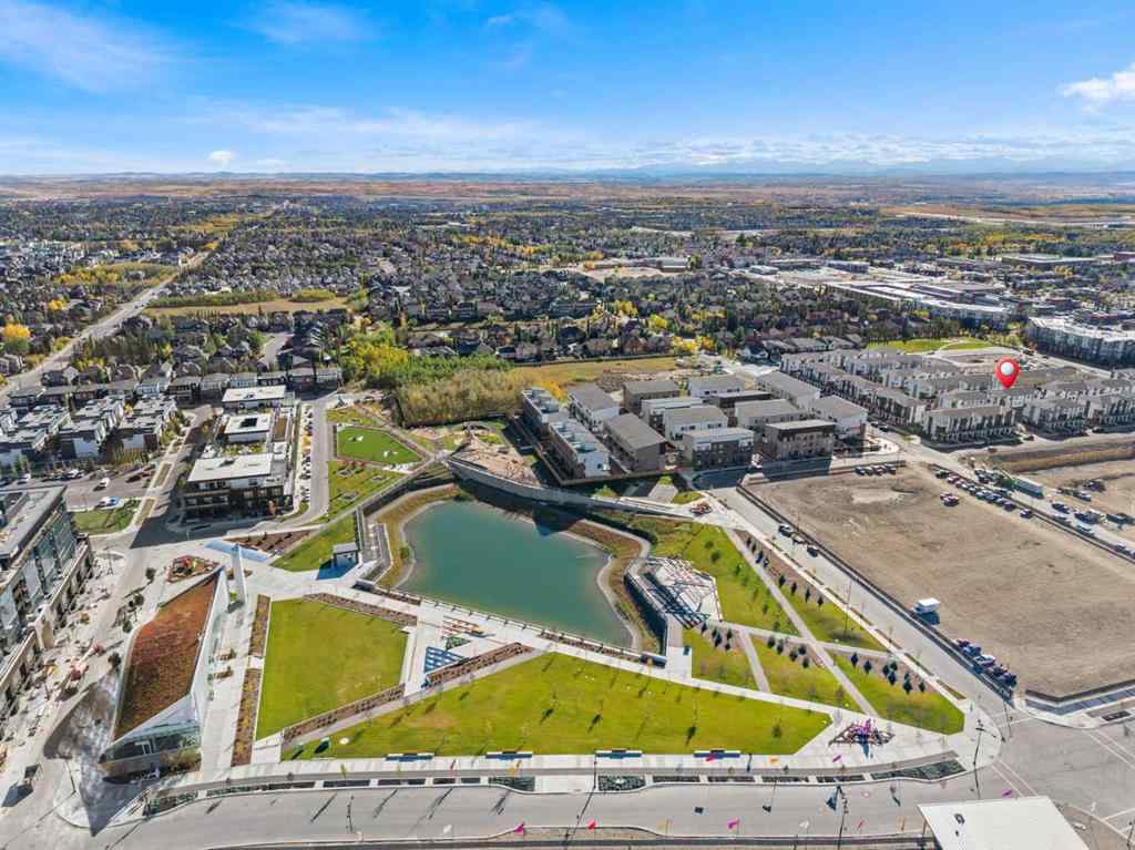 MLS® A2262499 - Unit #116 8235 8 Avenue SW in West Springs Calgary, Residential