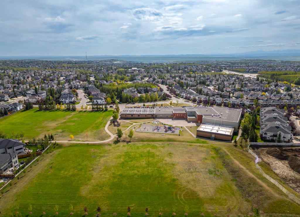 MLS® A2262499 - Unit #116 8235 8 Avenue SW in West Springs Calgary, Residential