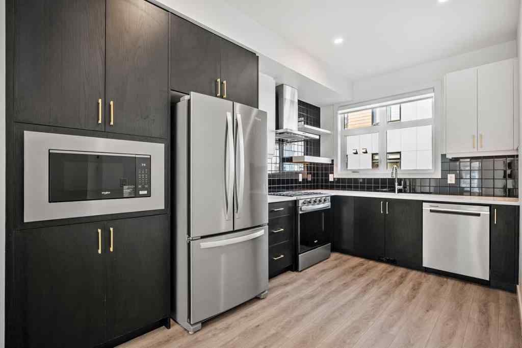 MLS® A2262499 - Unit #116 8235 8 Avenue SW in West Springs Calgary, Residential