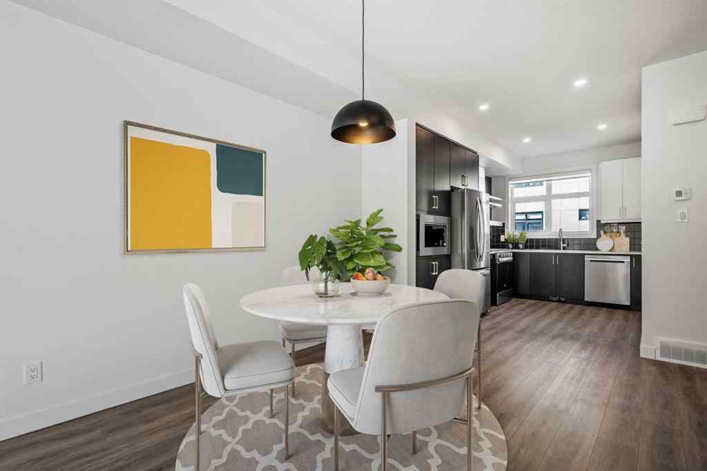 MLS® A2262499 - Unit #116 8235 8 Avenue SW in West Springs Calgary, Residential