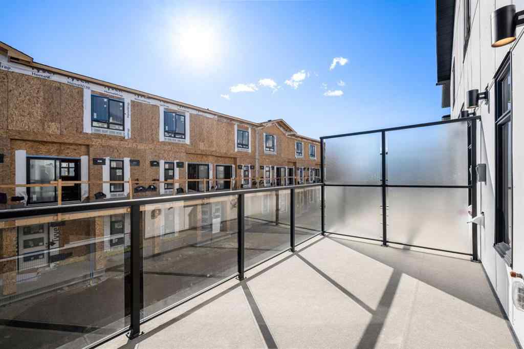 MLS® A2262499 - Unit #116 8235 8 Avenue SW in West Springs Calgary, Residential