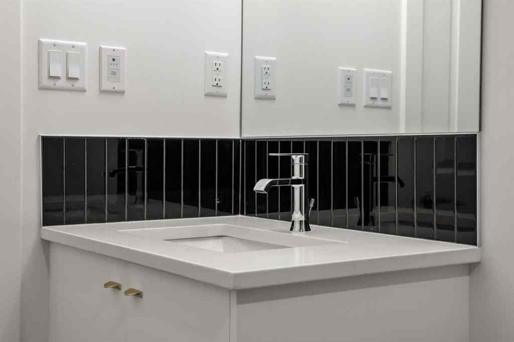 MLS® A2262499 - Unit #116 8235 8 Avenue SW in West Springs Calgary, Residential