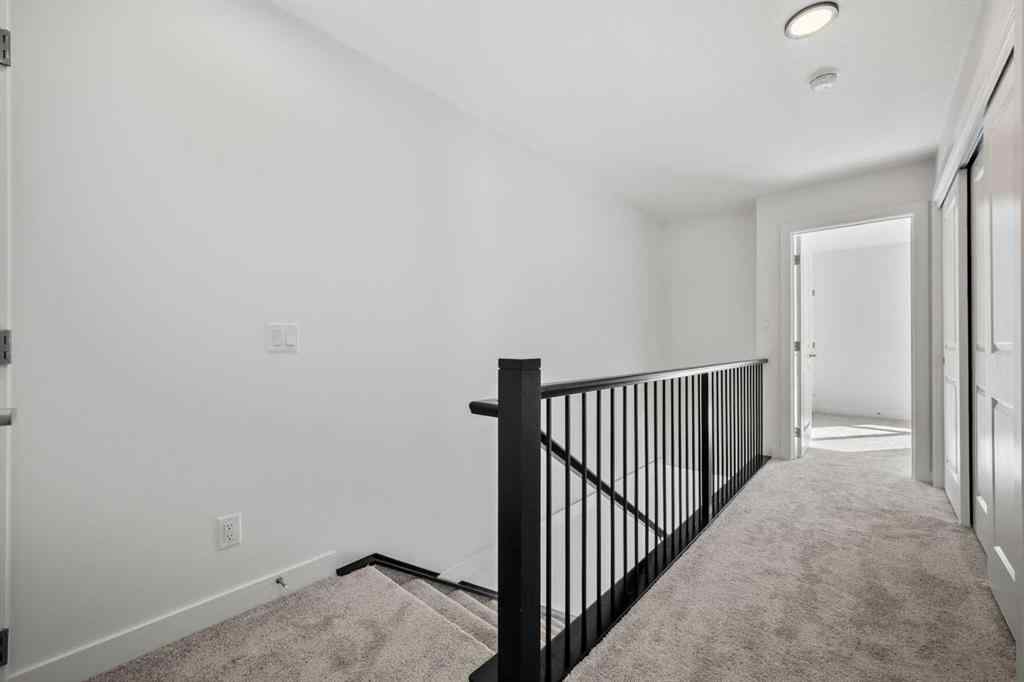 MLS® A2262499 - Unit #116 8235 8 Avenue SW in West Springs Calgary, Residential