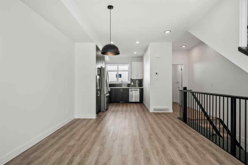 MLS® A2262499 - Unit #116 8235 8 Avenue SW in West Springs Calgary, Residential