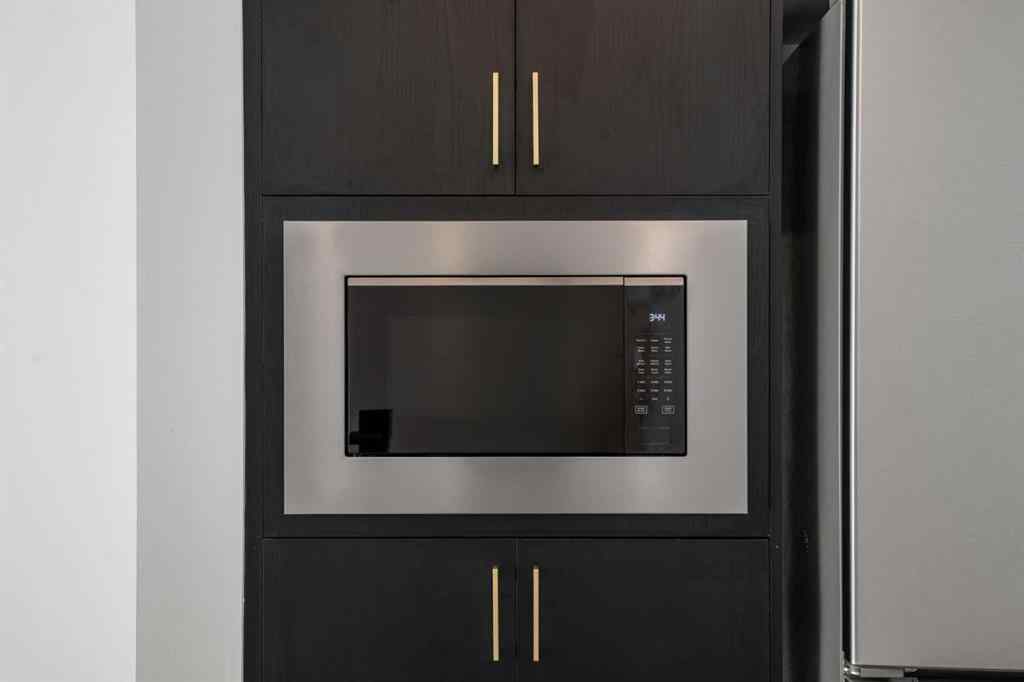 MLS® A2262499 - Unit #116 8235 8 Avenue SW in West Springs Calgary, Residential