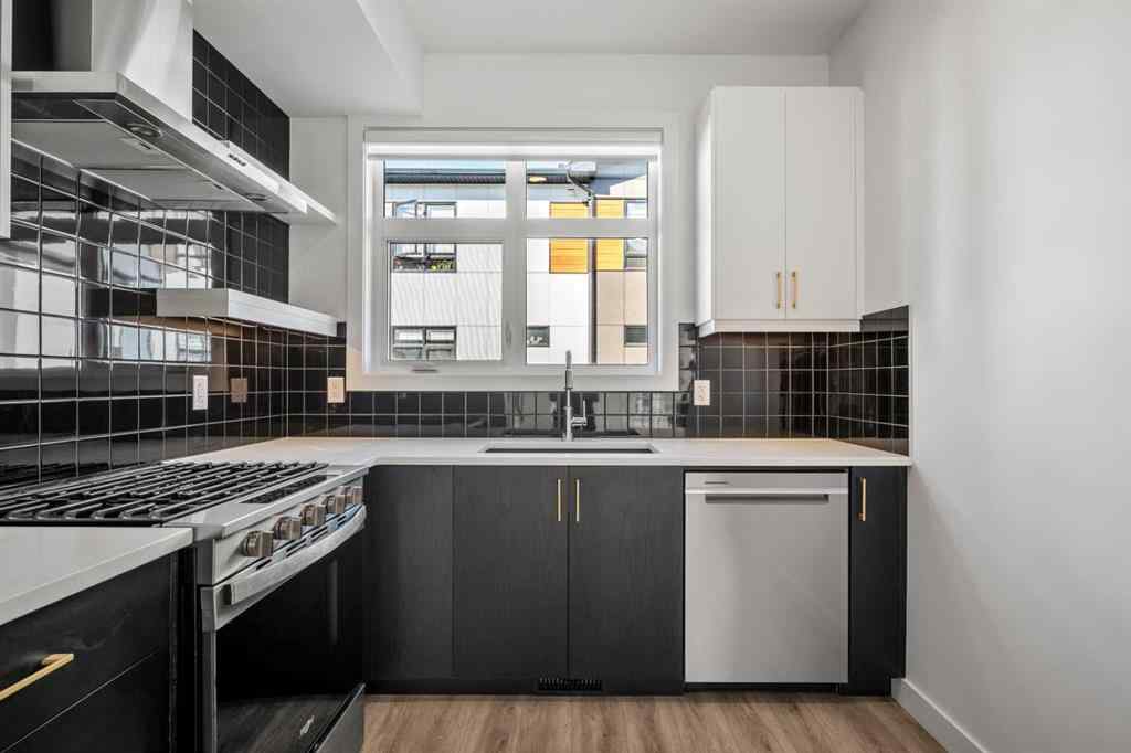 MLS® A2262499 - Unit #116 8235 8 Avenue SW in West Springs Calgary, Residential