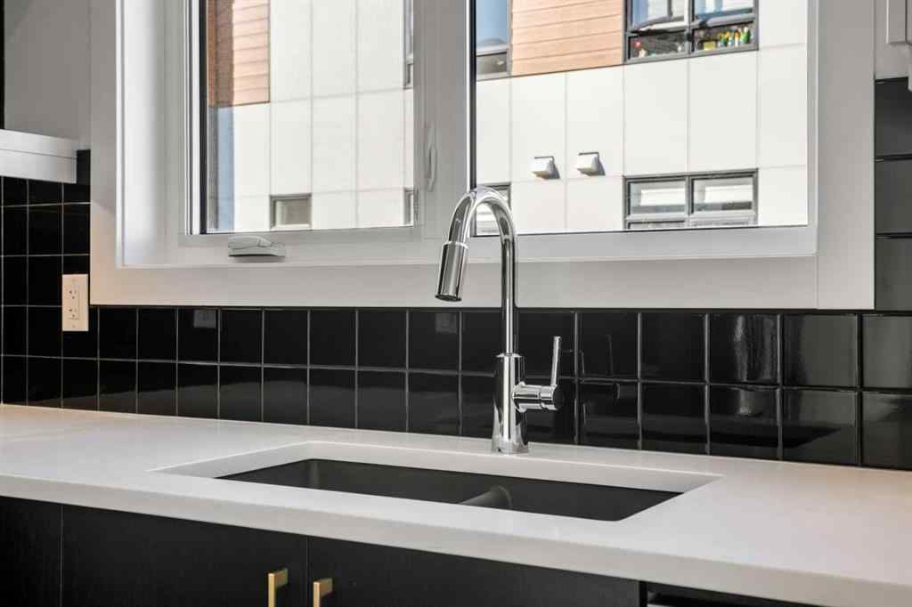 MLS® A2262499 - Unit #116 8235 8 Avenue SW in West Springs Calgary, Residential