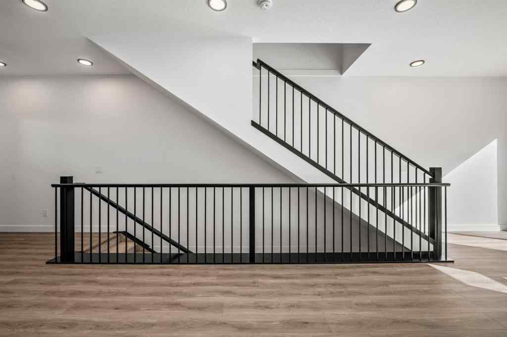 MLS® A2262499 - Unit #116 8235 8 Avenue SW in West Springs Calgary, Residential