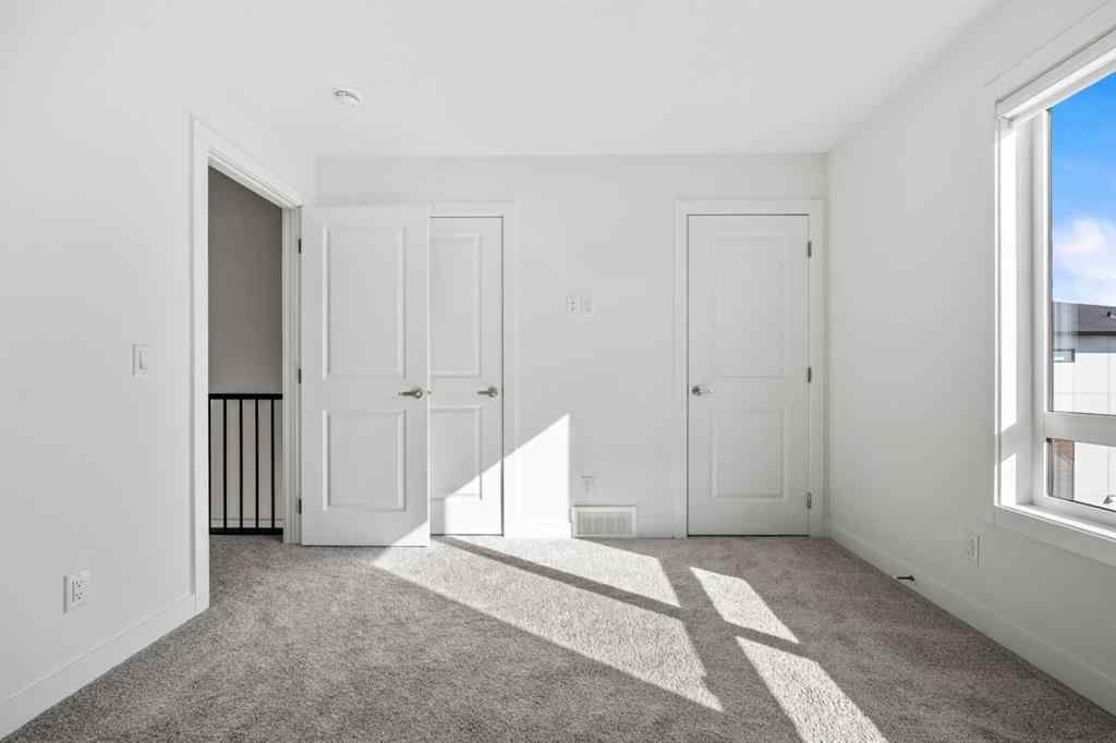 MLS® A2262499 - Unit #116 8235 8 Avenue SW in West Springs Calgary, Residential