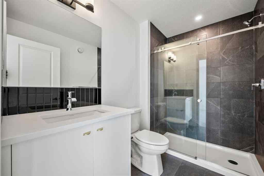 MLS® A2262499 - Unit #116 8235 8 Avenue SW in West Springs Calgary, Residential