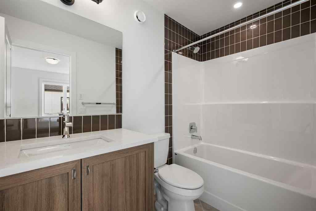 MLS® A2262501 - 8331 8 Avenue SW in West Springs Calgary, Residential