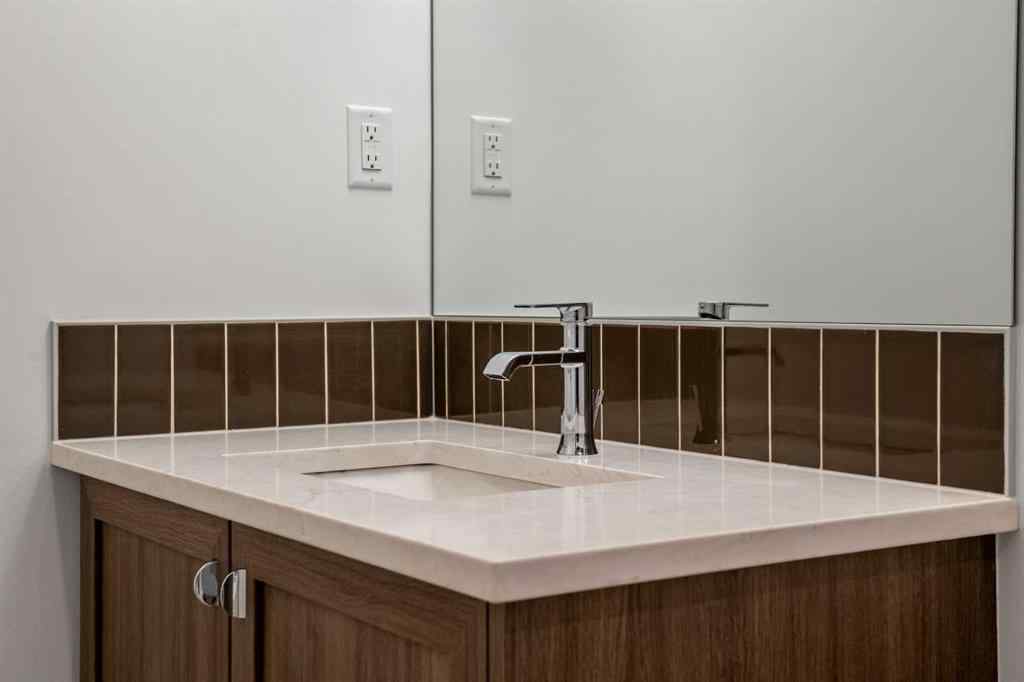 MLS® A2262501 - 8331 8 Avenue SW in West Springs Calgary, Residential