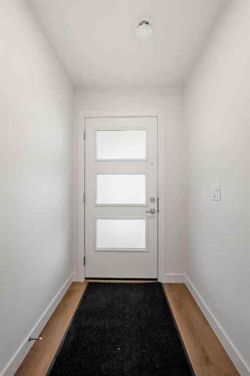 MLS® A2262501 - 8331 8 Avenue SW in West Springs Calgary, Residential