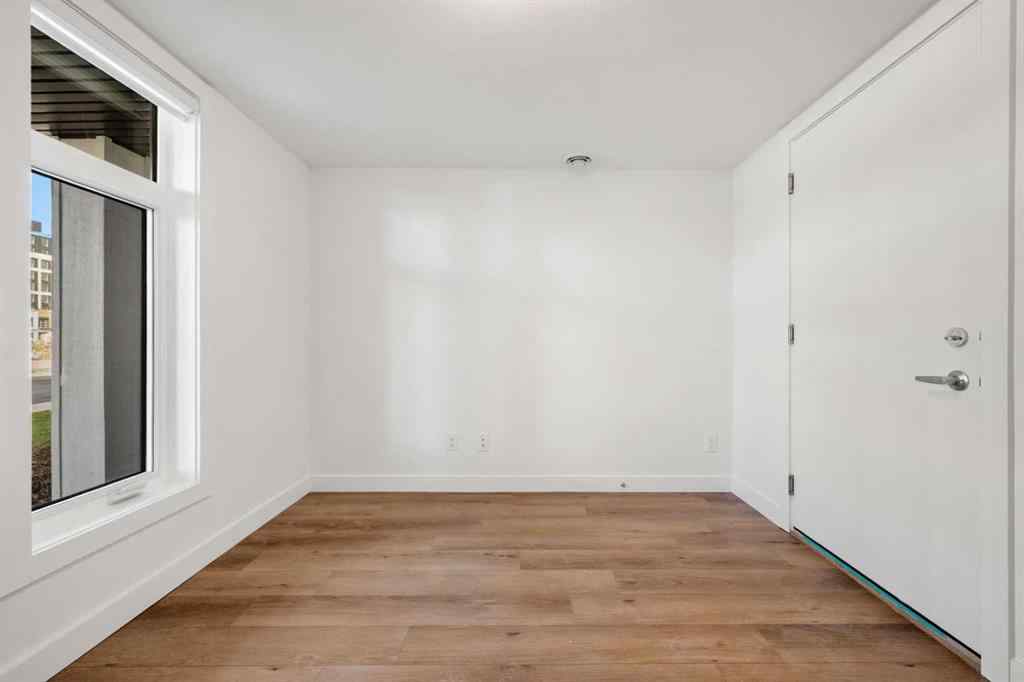 MLS® A2262501 - 8331 8 Avenue SW in West Springs Calgary, Residential